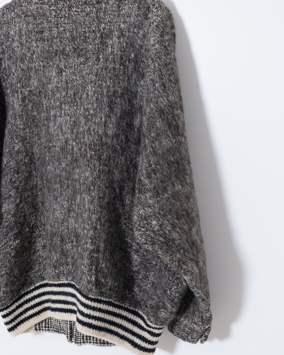 Dolman sleeve panel switch wool knit blouson