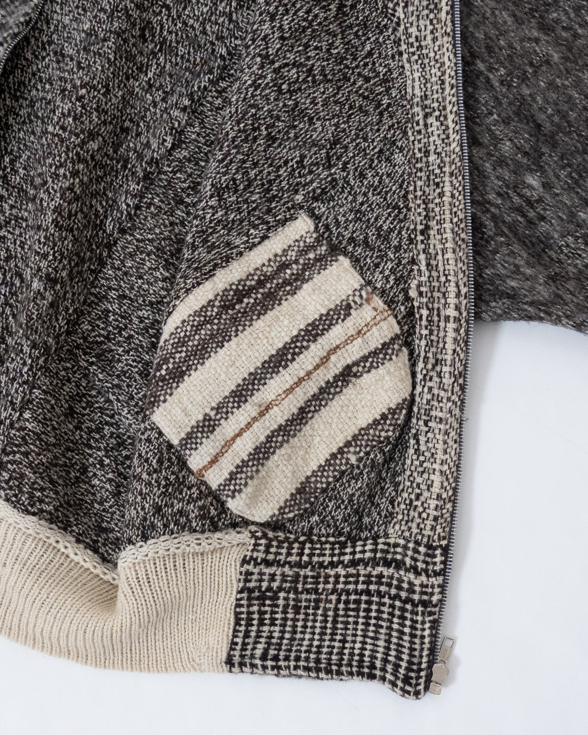 Dolman sleeve panel switch wool knit blouson