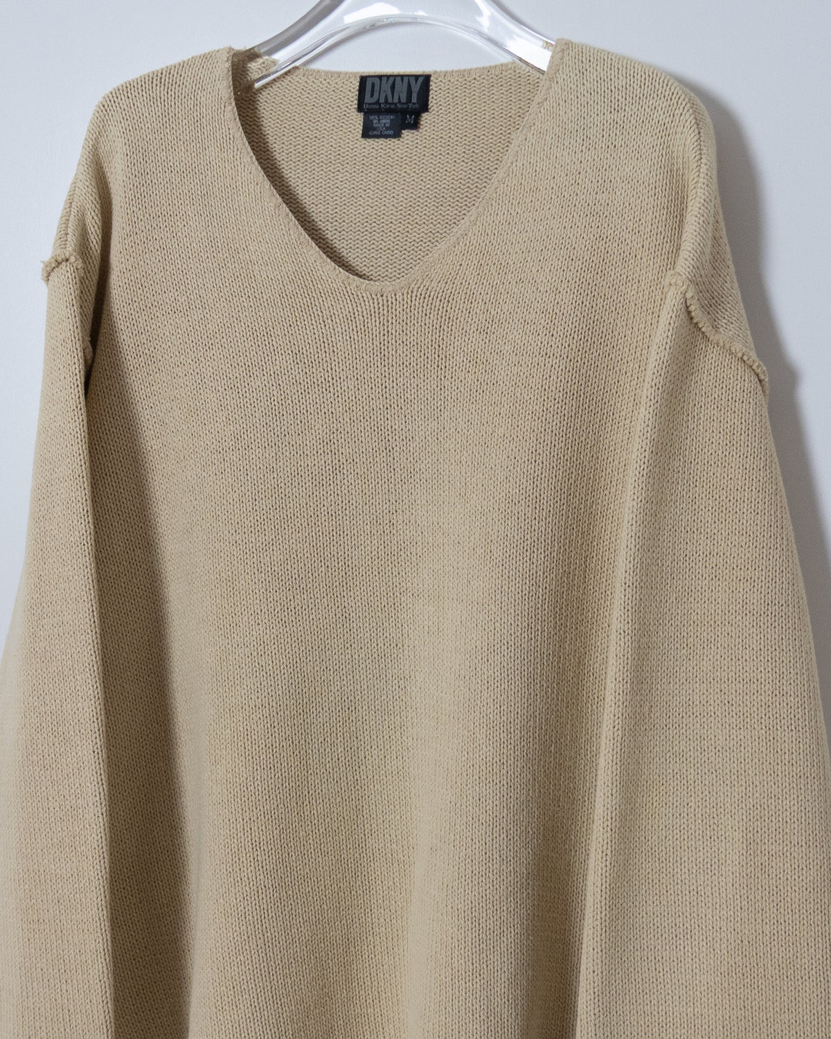 "DKNY" inside-out v-neck cotton knit sweater